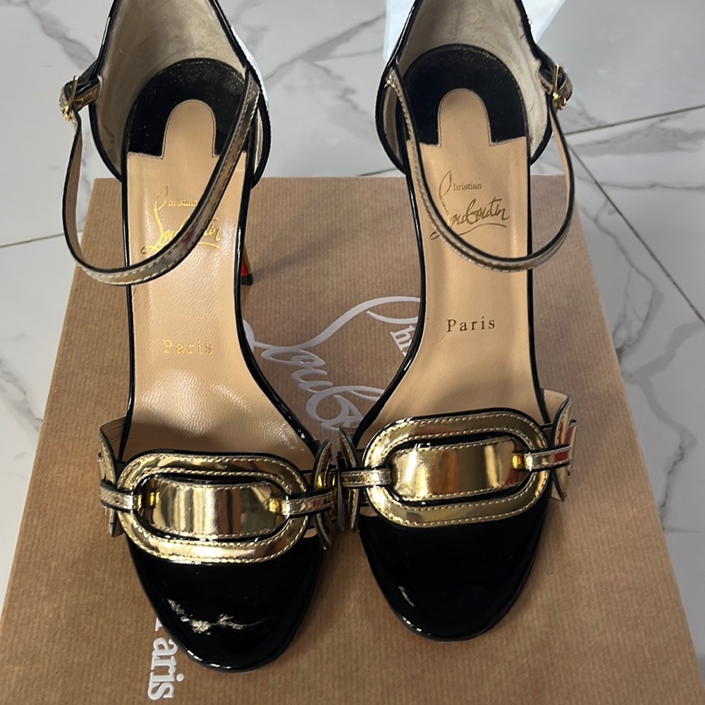 Black and gold Christian Louboutin stilettos size 39 like new